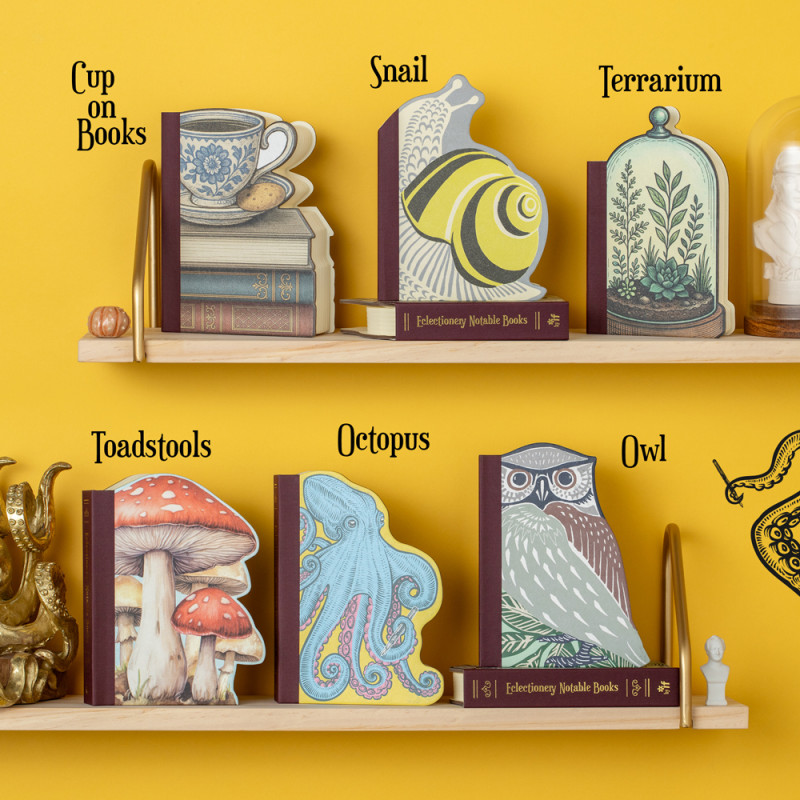 Eclectionery Notable Books - Cup on Books